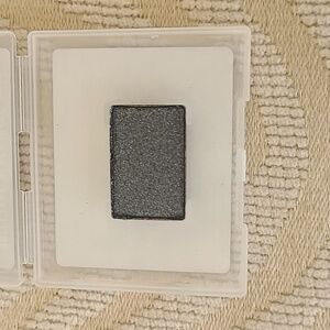 Mary Kay Brilliant Black eyeshadow.